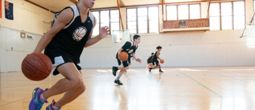 Basketball camper practicing driving